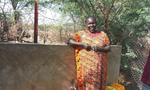Siama Juma, Chairperson Of Wmcs Poses For A Picture At Atalabara Water Point1